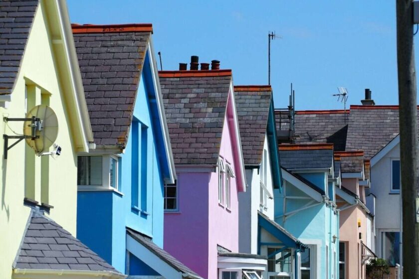 colorful houses under a cloudy sky