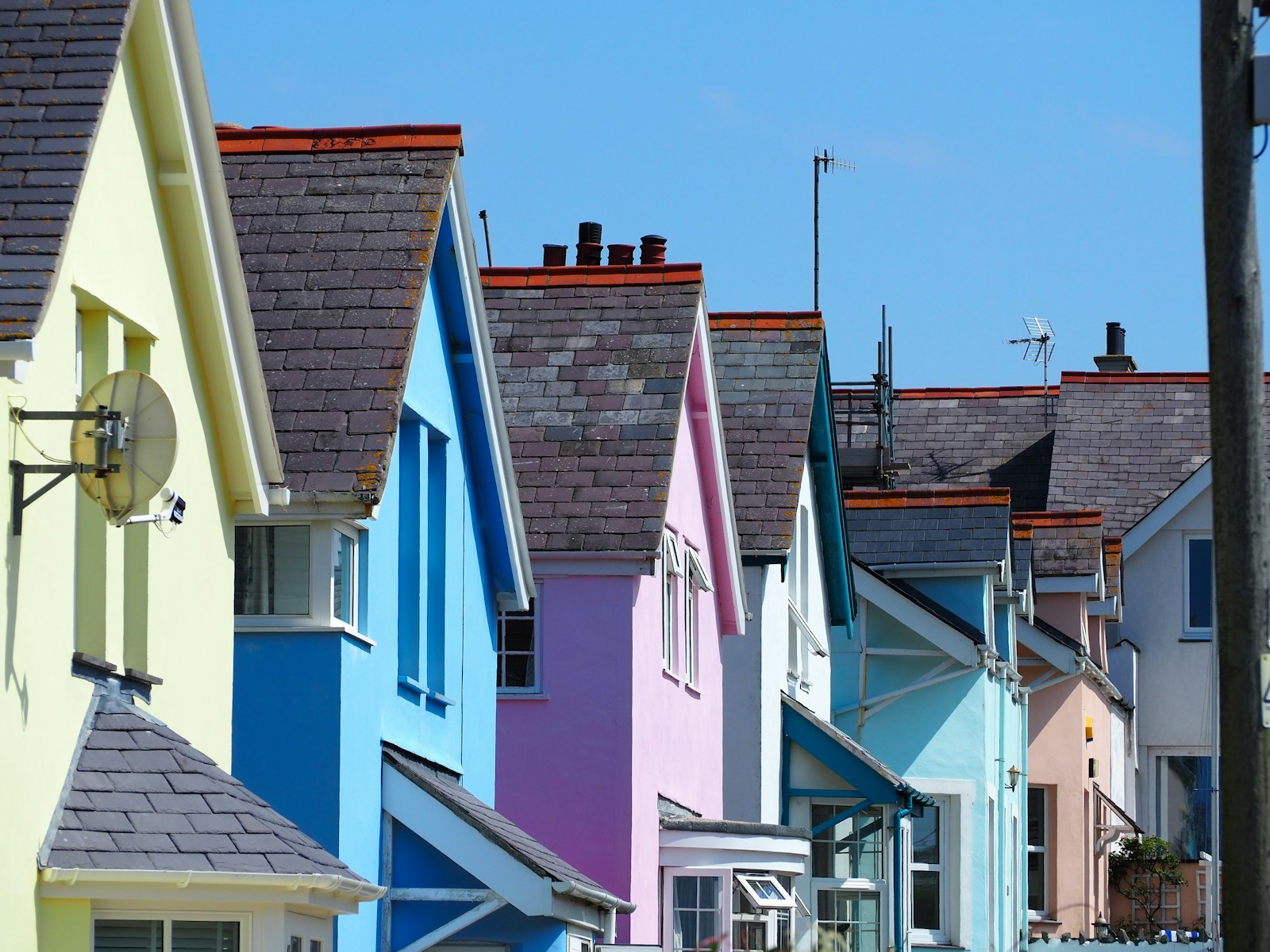 colorful houses under a cloudy sky